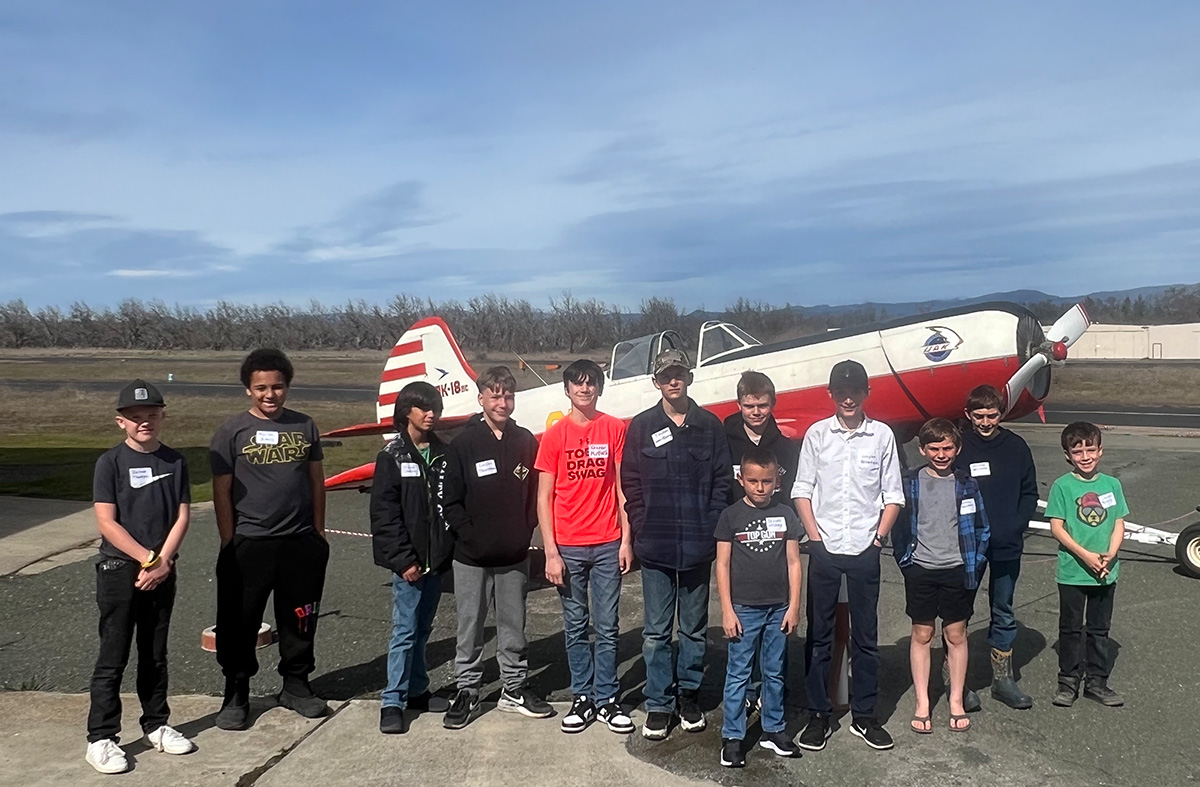Students participating in the Clear Lake Flying Club Introduction to Aviation class in front of Kevin Soto's Yak 18, Lampson Field Airport (1O2), Lakeport, CA, AHLC4718, herblingl.com